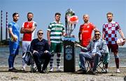 13 June 2025; Virgin Media presenter Tommy Martin and pundit Vinny Perth pictured with, from left, Ryan Burke of Waterford, Ryan McLaughlin of St Patrick's Athletic, Dylan Watts of Shamrock Rovers, Mark Coyle of Shelbourne and Paul Doyle of Drogheda United during a Football Doesn’t Stop for the Summer photocall for Virgin Media Television on Sandymount Beach in Dublin. Photo by David Fitzgerald/Sportsfile