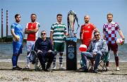 13 June 2025; Virgin Media presenter Tommy Martin and pundit Vinny Perth pictured with, from left, Ryan Burke of Waterford, Ryan McLaughlin of St Patrick's Athletic, Dylan Watts of Shamrock Rovers, Mark Coyle of Shelbourne and Paul Doyle of Drogheda United during a Football Doesn’t Stop for the Summer photocall for Virgin Media Television on Sandymount Beach in Dublin. Photo by David Fitzgerald/Sportsfile