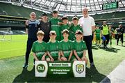 11 June 2025; Cornafulla NS, Roscommon, players; Paddy Kelly, Mark Macken, Conall Martin, Ruairi Holohan, Kevin Timlin, Paul McCarron, Alfie Allen, Fionn Mulvihill and teachers Richard Dolan and Sean Glennon before the FAI Primary 5s Finals Day at the Aviva Stadium in Dublin. Photo by Seb Daly/Sportsfile