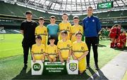 11 June 2025; St Mary’s NS, Threemilehouse, Monaghan, players; Rory Mc Carville, Noah Keenan, Shea Daly, Odhrán Murphy, Cillian Kierans, Shane Keelin, Callum Mc Cormilla, Dáire Treanor and teachers Christopher Rice and Conor Clerkin before the FAI Primary 5s Finals Day at the Aviva Stadium in Dublin. Photo by Seb Daly/Sportsfile