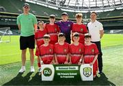 11 June 2025; Clonmoney NS, Newmarket on Fergus, Clare, players; Ethan O’Brien Sperber, Tom Coyle, Conall Earley, Seán Barron, Rian O’Connor, Matthew Murphy, Diarmuid Boyce, Eliah Kenny and teachers David McCormack and Colin Guilfoyle before the FAI Primary 5s Finals Day at the Aviva Stadium in Dublin. Photo by Seb Daly/Sportsfile