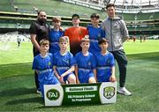 11 June 2025; Lusk SNS, Dublin, players; Finn Hurley, Patryk Jachymczak, Jamie Walsh, Harley Christie, Harry Gleeson, Dylan Maguire, Miki Jachymczak and teachers Darren Daly and Joe Gleeson during the FAI Primary 5s Finals Day at the Aviva Stadium in Dublin. Photo by Seb Daly/Sportsfile