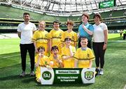 11 June 2025; St Oliver Plunkett NS, Monaghan, players; David Malone, Patrick O’Brien, Dylan Hourigan, Conor Reilly, Rhys Brannigan, Leah Duffy, Evan Carville, Oscar Pollock and teachers Aiden Quinn and Julie Brennan during the FAI Primary 5s Finals Day at the Aviva Stadium in Dublin. Photo by Seb Daly/Sportsfile