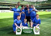 11 June 2025; St Patrick’s Special School, Kilkenny, players; Daire Teehan, Jamie Matthews, Leo Kennedy, Eoin McNally, Bernard Comerford, Ryan Wall, Ryan Kelly, Noah Hynes and teachers Shane Joyce and Glyn Carolan during the FAI Primary 5s Finals Day at the Aviva Stadium in Dublin. Photo by Seb Daly/Sportsfile