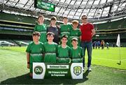 11 June 2025; Scoil Íosa, Oranmore, Galway, players; Aaron Lennon, Pádraig Burke, Cillian Keating, Kyle Cormican, Max Dooley, Glaston Curley, Stevie Mannion, Tom Gillen and teachers John Gormally and Mark O’Boyle during the FAI Primary 5s Finals Day at the Aviva Stadium in Dublin. Photo by Seb Daly/Sportsfile
