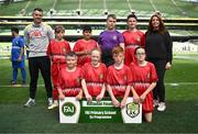 11 June 2025; Catherine McAuley School, Limerick, players; Jay Reddan, Aoibheann McCarthy, Mia O’Dwyer, Patrick O’Dwyer, John Deane Moran, Zaroon Abbasi, Rhys Johnson, Sean Carey and teachers Jeremy Fox and Clodagh Carmody during the FAI Primary 5s Finals Day at the Aviva Stadium in Dublin. Photo by Seb Daly/Sportsfile
