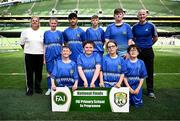 11 June 2025; Scoil Eoin, Crumlin, Dublin, players; Tommy Tobin, Eathan Cooney, Gabriella Duff, Cillian Watters, John Gaffney, Stephen Khedria, Lennon O’Brien, Vasile Dinu and teachers Richie Doran and Tracy Rankin during the FAI Primary 5s Finals Day at the Aviva Stadium in Dublin. Photo by Seb Daly/Sportsfile