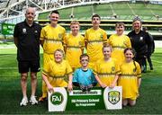 11 June 2025; Scoil Íosagáin, Buncrana, Inishowen, Donegal, players with teachers Maria Doherty and Jonathan Adair during the FAI Primary 5s Finals Day at the Aviva Stadium in Dublin. Photo by Seb Daly/Sportsfile