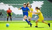 11 June 2025; Wallis Ashmore of Marshalstown NS, Wexford, in action against Rose Connolly of St Felim’s NS, Ballinagh, Cavan, during the FAI Primary 5s Finals Day at the Aviva Stadium in Dublin. Photo by Seb Daly/Sportsfile