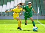 11 June 2025; Ruby Ní Mhaonaigh of Scoil Fhursa, Gaillimh, in action against Leona Fitzpatrick of St Felim’s NS, Ballinagh, Cavan, during the FAI Primary 5s Finals Day at the Aviva Stadium in Dublin. Photo by Seb Daly/Sportsfile