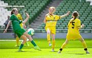 11 June 2025; Sinéad Nic Meanaman of Scoil Náisiúnta an Choimín, Dún na nGall in action against Karla Gibbons of Lankill NS, Aughagower, Westport, Mayo, during the FAI Primary 5s Finals Day at the Aviva Stadium in Dublin. Photo by Seb Daly/Sportsfile