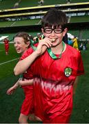 11 June 2025; Gearóid Cunningham of St Columba’s NS, Cork, celebrates with his medal after the FAI Primary 5s Finals Day at the Aviva Stadium in Dublin. Photo by Seb Daly/Sportsfile
