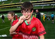 11 June 2025; Gearóid Cunningham of St Columba’s NS, Cork, celebrates with his medal after the FAI Primary 5s Finals Day at the Aviva Stadium in Dublin. Photo by Seb Daly/Sportsfile