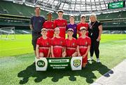 11 June 2025; Rathmore NS, Baltimore, Cork, players; Tadhg Ronan, Jesse Best, Theo Best, Fionn Daly, Senan Whooley, Paddy Sheehy, Ben Pitton Brady, Kingsley Crosby and teachers Maura Collins and John Garrett before the FAI Primary 5s Finals Day at the Aviva Stadium in Dublin. Photo by Seb Daly/Sportsfile