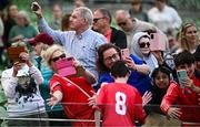 11 June 2025; St Columba’s NS, Cork, players after greeted by supporters after the FAI Primary 5s Finals Day at the Aviva Stadium in Dublin. Photo by Seb Daly/Sportsfile