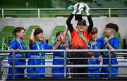11 June 2025; Lusk SNS, Dublin, captain Finn Hurley lifts the trophy alongside his teammates after winning the section C cup, for mixed large sized schools, during the FAI Primary 5s Finals Day at the Aviva Stadium in Dublin. Photo by Seb Daly/Sportsfile