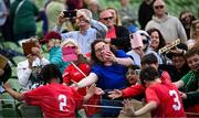 11 June 2025; St Columba’s NS, Cork, players after greeted by supporters after the FAI Primary 5s Finals Day at the Aviva Stadium in Dublin. Photo by Seb Daly/Sportsfile