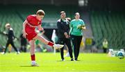 11 June 2025; Theo Best of Rathmore NS, Baltimore, Cork, scores a goal during the FAI Primary 5s Finals Day at the Aviva Stadium in Dublin. Photo by Seb Daly/Sportsfile