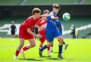 11 June 2025; Rían Ó Gallchóir of Gaelscoil Uí Chéadaigh, Wicklow, right, in action against Theo Best of Rathmore NS, Baltimore, Cork, during the FAI Primary 5s Finals Day at the Aviva Stadium in Dublin. Photo by Seb Daly/Sportsfile