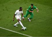 6 June 2025; Abdallah Sima of Senegal in action against Adam Idah of Republic of Ireland during the international friendly match between Republic of Ireland and Senegal at the Aviva Stadium in Dublin. Photo by Piaras Ó Mídheach/Sportsfile