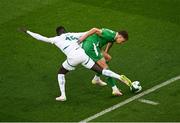6 June 2025; Kasey McAteer of Republic of Ireland in action against Krépin Diatta of Senegal during the international friendly match between Republic of Ireland and Senegal at the Aviva Stadium in Dublin. Photo by Piaras Ó Mídheach/Sportsfile
