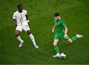 6 June 2025; Robbie Brady of Republic of Ireland in action against Abdallah Sima of Senegal during the international friendly match between Republic of Ireland and Senegal at the Aviva Stadium in Dublin. Photo by Piaras Ó Mídheach/Sportsfile