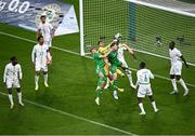 6 June 2025; Republic of Ireland players, Nathan Collins, right, and Kasey McAteer in action against Senegal goalkeeper Yehvann Diouf during the international friendly match between Republic of Ireland and Senegal at the Aviva Stadium in Dublin. Photo by Piaras Ó Mídheach/Sportsfile