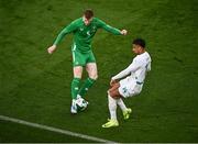 6 June 2025; Jake O'Brien of Republic of Ireland in action against Ismail Jakobs of Senegal during the international friendly match between Republic of Ireland and Senegal at the Aviva Stadium in Dublin. Photo by Piaras Ó Mídheach/Sportsfile