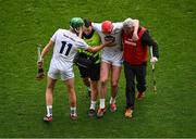 8 June 2025; Jack Sheridan of Kildare checks on James Burke of Kildare as leaves the pitch to receive medical attention for an injury during the Joe McDonagh Cup final match between Kildare and Laois at Croke Park in Dublin. Photo by Piaras Ó Mídheach/Sportsfile