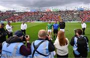 7 June 2025; Referee Thomas Walsh with team captains Cian Lynch of Limerick and Robert Downey of Cork for the coin toss before the Munster GAA Hurling Senior Championship final match between Limerick and Cork at TUS Gaelic Grounds in Limerick. Photo by Piaras Ó Mídheach/Sportsfile