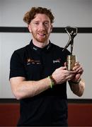 12 June 2025; PwC GAA/GPA Player of the Month for May in hurling Cian Lynch of Limerick with his award at the PwC offices in Limerick today. Photo by Shauna Clinton/Sportsfile