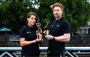 12 June 2025; PwC GAA/GPA Player of the Month for May in hurling, Cian Lynch of Limerick, and PwC GPA Player of the Month for May in camogie, Niamh Rockett of Waterford, with their awards at PwC offices in Limerick today. Photo by Shauna Clinton/Sportsfile