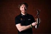 12 June 2025; PwC GAA/GPA Player of the Month for May in hurling Cian Lynch of Limerick with his award outside the PwC offices in Limerick today. Photo by Shauna Clinton/Sportsfile