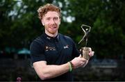 12 June 2025; PwC GAA/GPA Player of the Month for May in hurling Cian Lynch of Limerick with his award outside the PwC offices in Limerick today. Photo by Shauna Clinton/Sportsfile