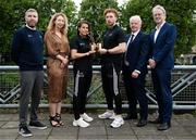 12 June 2025; PwC GAA/GPA Player of the Month for May in hurling, Cian Lynch of Limerick, and PwC GPA Player of the Month for May in camogie, Niamh Rockett of Waterford, with their awards, centre, alongside, from left, GPA Head of Communications Kieran McSweeney, PwC Partner Mairéad Connolly, Connacht GAA President Vincent Neary and PwC Senior Partner John Daly at the PwC offices in Limerick today. Photo by Shauna Clinton/Sportsfile