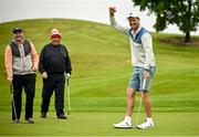 12 June 2025; Former Republic of Ireland international soccer player Niall Quinn celebrates a putt in the company of Cyril O’Neill and RTÉ presenter Des Cahill during the annual Team Ireland Olympic Golf Fundraiser at The K Club in Kildare in support of the Make a Difference fund, helping athletes pursue their sporting dreams. Photo by David Fitzgerald/Sportsfile