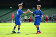 11 June 2025; Miki Jachymczak of Lusk SNS, Dublin, right, celebrates with teammate Dylan Maguire after scoring a goal during the FAI Primary 5s Finals Day at the Aviva Stadium in Dublin. Photo by Seb Daly/Sportsfile