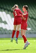 11 June 2025; Aoife Halley of Monaleen NS, Limerick, right, celebrates with teammate Kate Sheehan after scoring a goal during the FAI Primary 5s Finals Day at the Aviva Stadium in Dublin. Photo by Seb Daly/Sportsfile