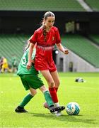 11 June 2025; Aoife Halley of Monaleen NS, Limerick, in action against Orla Ní Chonláin of Gaelscoil Mhic Amhlaigh, Gaillimh, during the FAI Primary 5s Finals Day at the Aviva Stadium in Dublin. Photo by Seb Daly/Sportsfile
