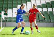11 June 2025; Anna Ryan of St Patrick’s NS, Diswellstown, Dublin, in action against Aoife Halley of Monaleen NS, Limerick, during the FAI Primary 5s Finals Day at the Aviva Stadium in Dublin. Photo by Seb Daly/Sportsfile