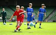 11 June 2025; Harry Randles of Scoil Niocláis, Corcaigh, scores a penalty during the FAI Primary 5s Finals Day at the Aviva Stadium in Dublin. Photo by Seb Daly/Sportsfile