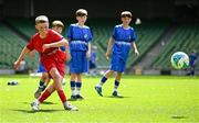 11 June 2025; Harry Randles of Scoil Niocláis, Corcaigh, scores a penalty during the FAI Primary 5s Finals Day at the Aviva Stadium in Dublin. Photo by Seb Daly/Sportsfile