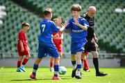 11 June 2025; Harry Gleeson of Lusk SNS, Dublin, right, celebrates with teammate Miki Jachymczak after scoring a goal during the FAI Primary 5s Finals Day at the Aviva Stadium in Dublin. Photo by Seb Daly/Sportsfile