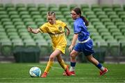 11 June 2025; Méabh Scanlon of Scoil Íosagáin, Buncrana, Inishowen, Donegal, in action against Gabriella Duff of Scoil Eoin, Crumlin, Dublin, during the FAI Primary 5s Finals Day at the Aviva Stadium in Dublin. Photo by Seb Daly/Sportsfile