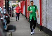 13 June 2025; Tyreke Wilson of Shelbourne, left, and Graham Burke of Shamrock Rovers arrive for the SSE Airtricity Men's Premier Division match between Shelbourne and Shamrock Rovers at Tolka Park in Dublin. Photo by Stephen McCarthy/Sportsfile