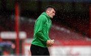 13 June 2025; Josh Honohan of Shamrock Rovers is hit by the water sprinklers before the SSE Airtricity Men's Premier Division match between Shelbourne and Shamrock Rovers at Tolka Park in Dublin. Photo by Stephen McCarthy/Sportsfile