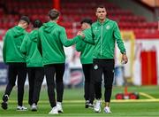 13 June 2025; Shamrock Rovers players including Graham Burke, right, walk the pitch before the SSE Airtricity Men's Premier Division match between Shelbourne and Shamrock Rovers at Tolka Park in Dublin. Photo by Sam Barnes/Sportsfile