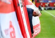 13 June 2025; A Shelbourne supporter hangs his flag before the SSE Airtricity Men's Premier Division match between Shelbourne and Shamrock Rovers at Tolka Park in Dublin. Photo by Stephen McCarthy/Sportsfile