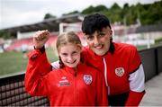 13 June 2025; Derry City supporters Ava Moreland, attending her first Derry City game, and Kelly Pritchard before the SSE Airtricity Men's Premier Division match between Derry City and Galway United at The Ryan McBride Brandywell Stadium in Derry. Photo by Ramsey Cardy/Sportsfile