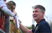 13 June 2025; St Patrick's Athletic manager Stephen Kenny signs autographs for supporters before the SSE Airtricity Men's Premier Division match between St Patrick's Athletic and Drogheda United at Richmond Park in Dublin. Photo by Shauna Clinton/Sportsfile